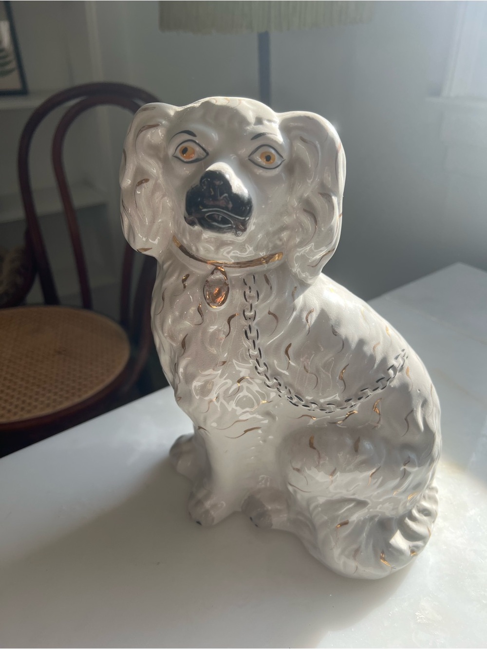 White Staffordshire Antique Dog Figurine with Gold Accents